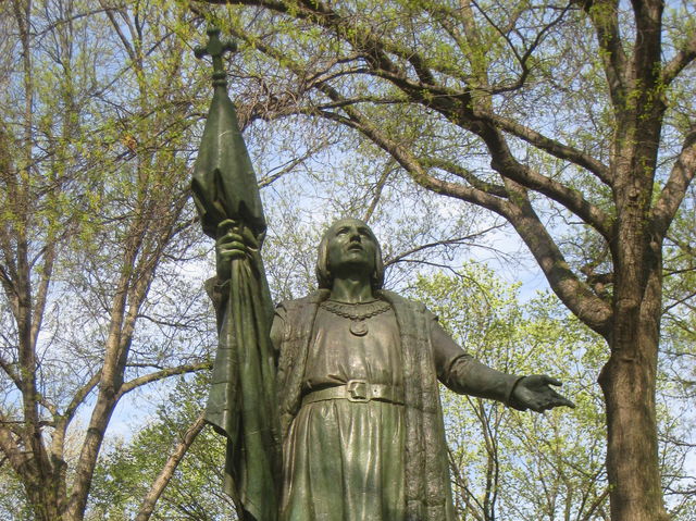 The statue's hands were painted red and its pedestal scrawled with graffiti including the hashtag “#somethingscoming.”