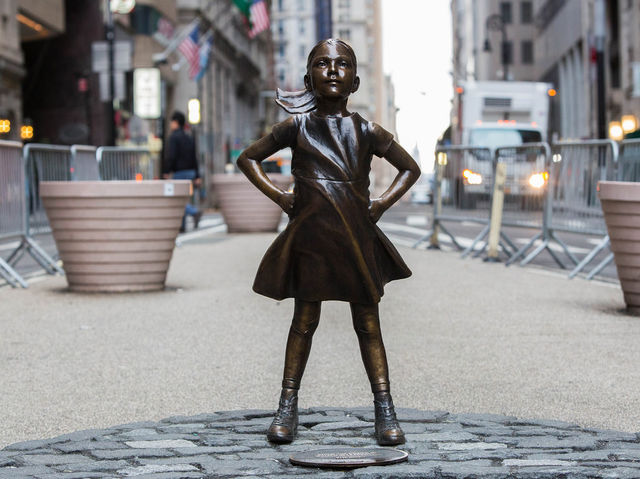 The urinating pug statue was placed by sculptor Alex Gardega who called "Fearless Girl" "corporate nonsense." The dog was removed not long after it appeared.