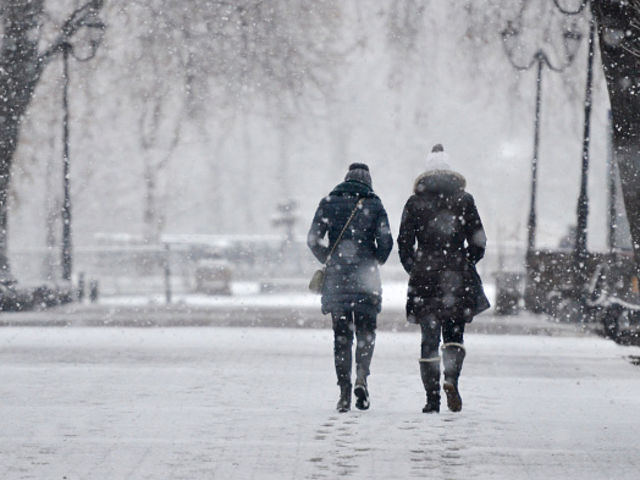 On a freezing cold winter day, what do you wish you were doing?