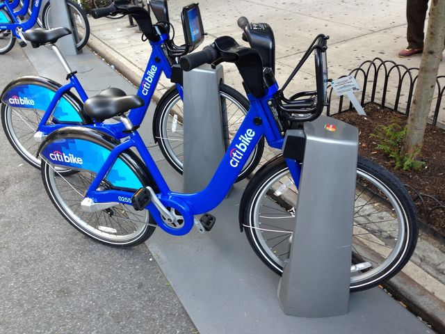 A 36-year-old was struck by a bus and killed in Manhattan on Monday while riding a Citi Bike, the first fatality involving the bike-sharing program.